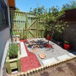Proyectos patio paisajismo bancas y gravilla 11